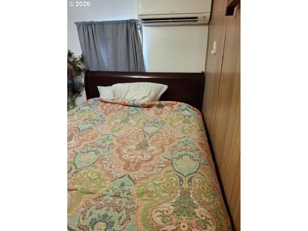 a kitchen with a stove and cabinets