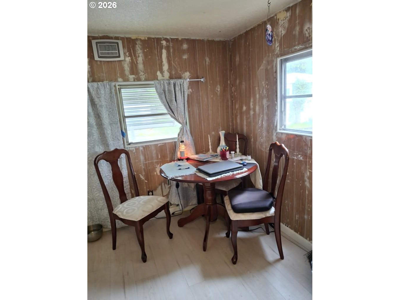 3950 Coburg Road, Unit 3 Eugene, OR 97408 - Photo 6 of 14 a view of a workspace with furniture and a window