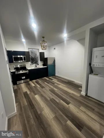 a view of kitchen and sink