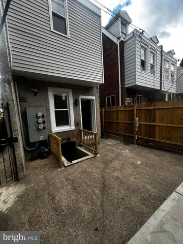 a front view of a house with parking space