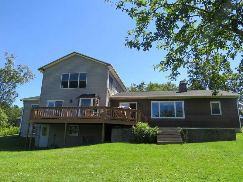760 Pond Road Sidney, ME 04330 - Photo 4 of 34 Exterior Back. Showing lots of glass...