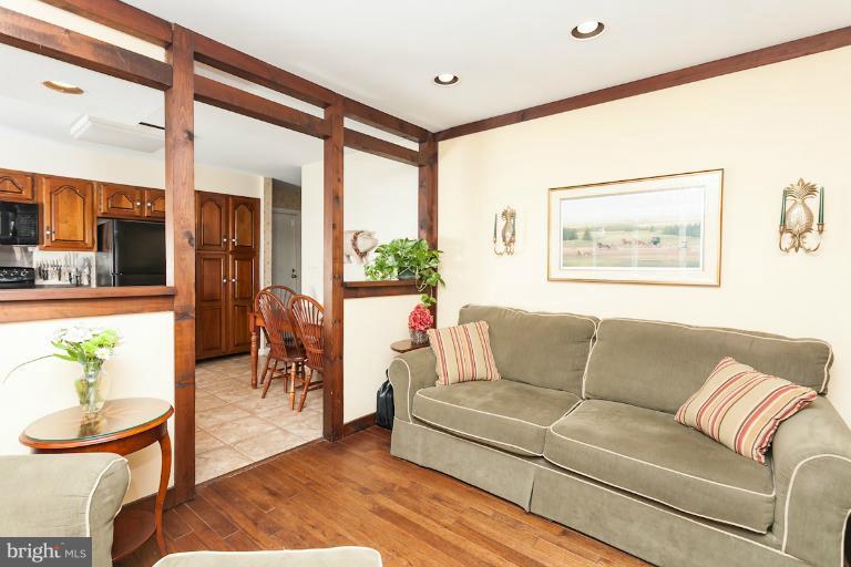14206 Sagewood Road Phoenix, MD 21131 - Photo 1 of 24 a living room with furniture and a large window