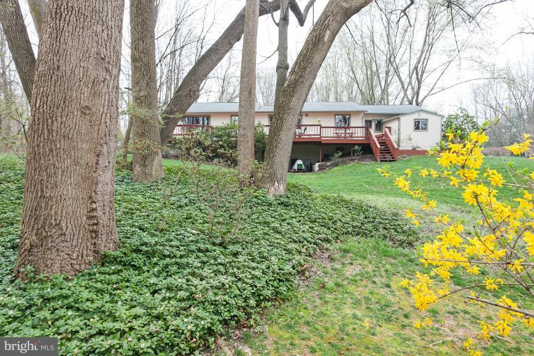 14206 Sagewood Road Phoenix, MD 21131 - Photo 4 of 24 a view of a house with backyard and sitting area