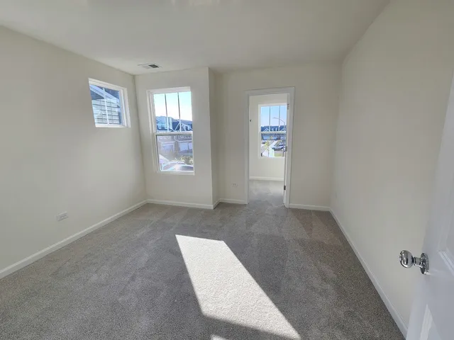 an empty room with windows