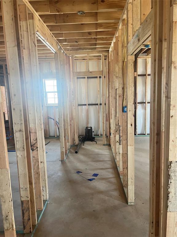 5394 West Highway 199 Springtown, TX 76082 - Photo 13 of 20 a view of a hallway with wooden walls and entryway
