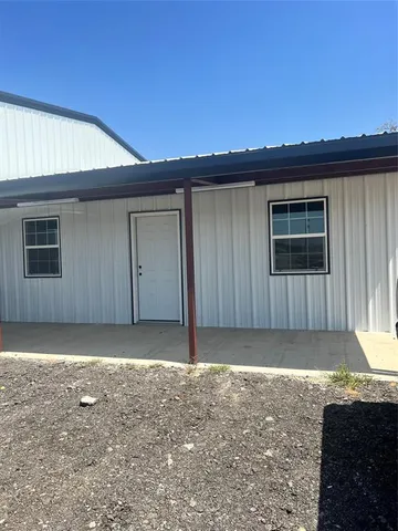 a view of a garage with furniture