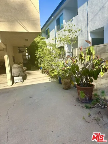 a view of a backyard with chair the garden
