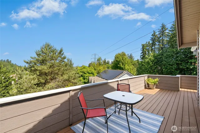 a outdoor dining space with furniture and garden view