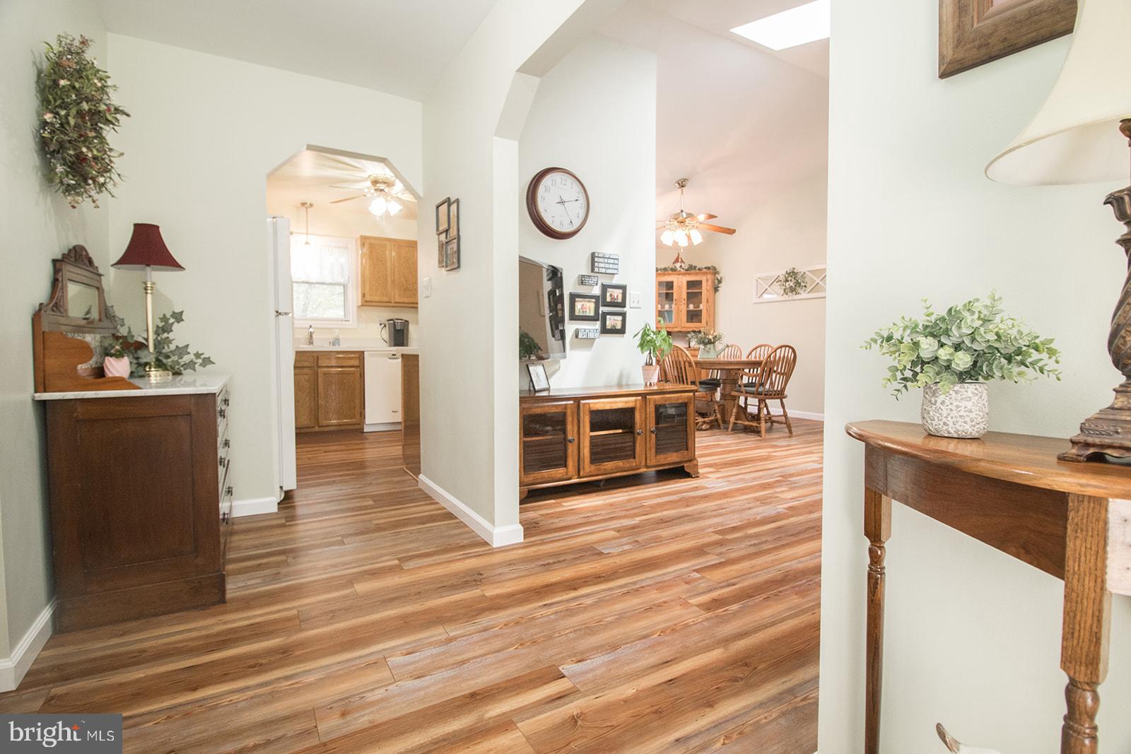 11620 Big Sandy Run Road Lusby, MD 20657 - Photo 23 of 64 a view of a living room and kitchen