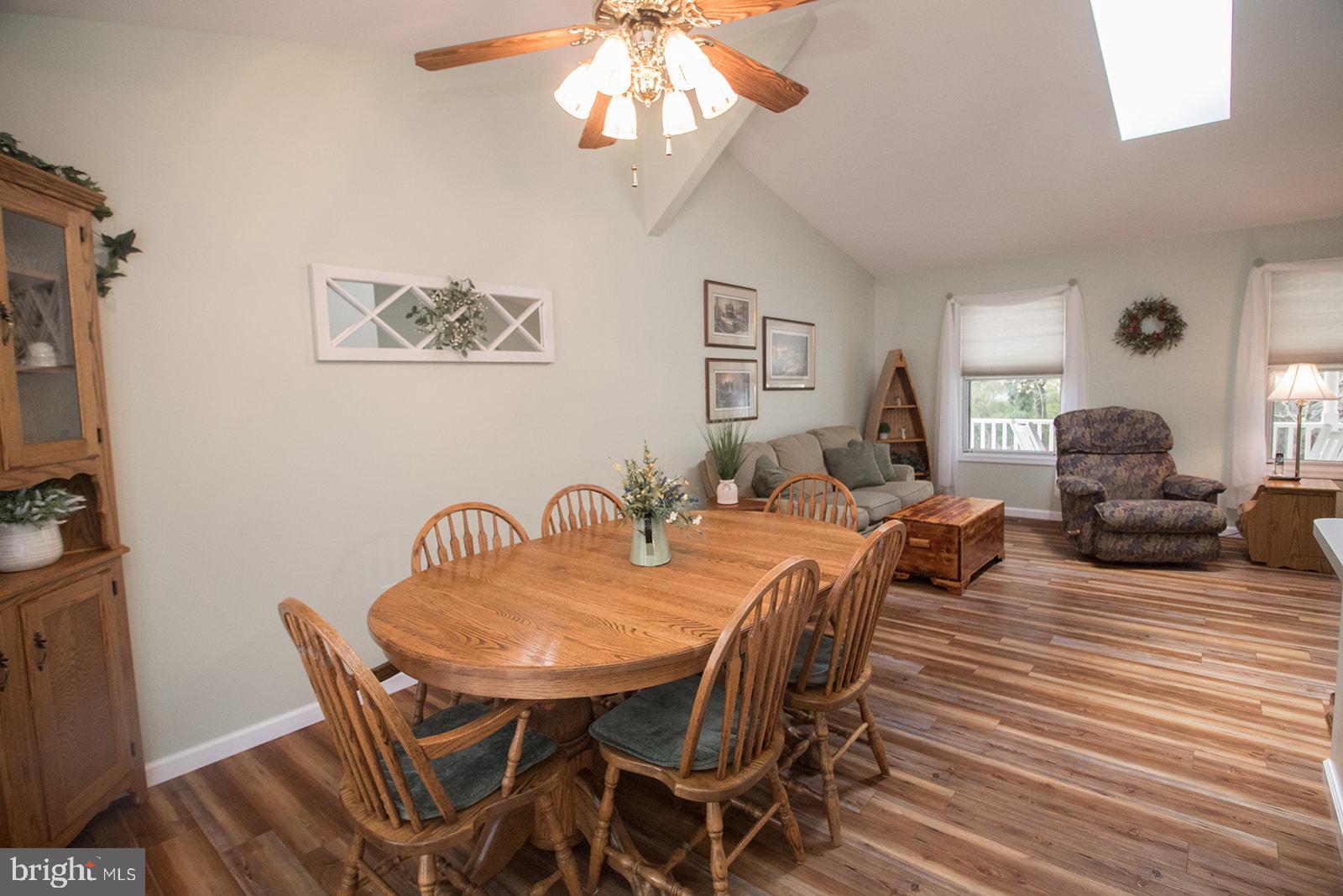 11620 Big Sandy Run Road Lusby, MD 20657 - Photo 28 of 64 a view of a a dining room with furniture window and wooden floor