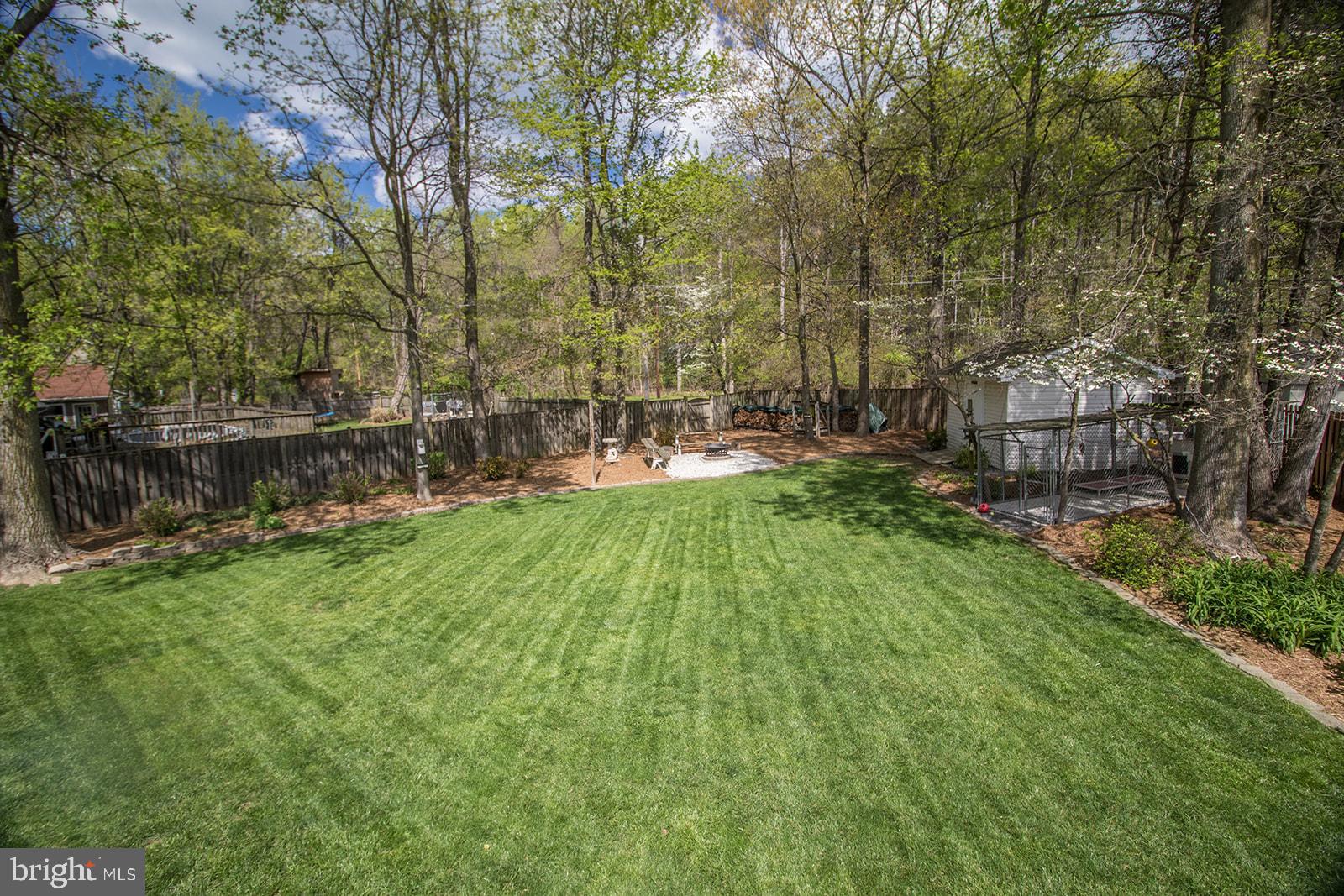 11620 Big Sandy Run Road Lusby, MD 20657 - Photo 56 of 64 a view of a backyard with a garden