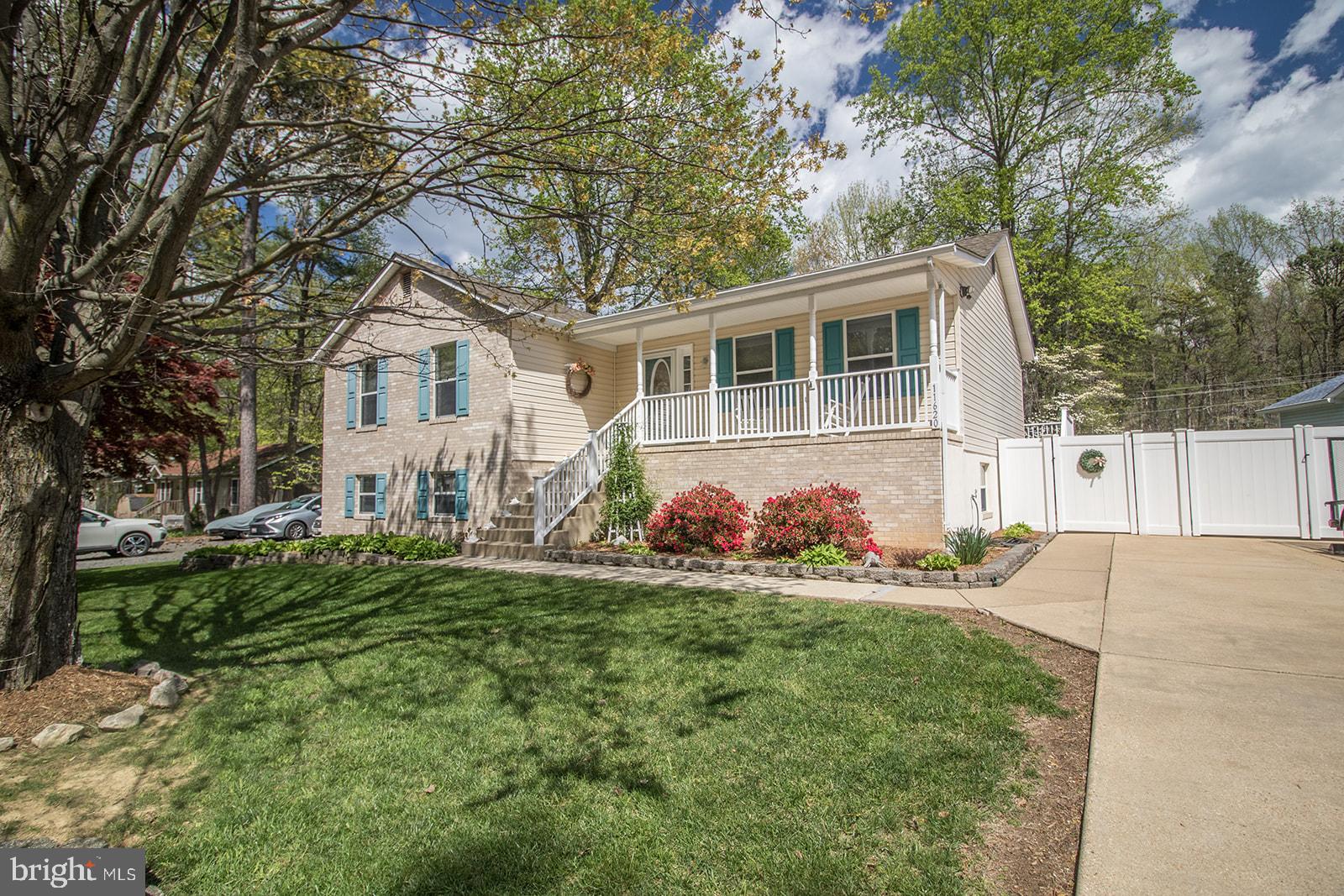 11620 Big Sandy Run Road Lusby, MD 20657 - Photo 62 of 64 a front view of house with yard and green space