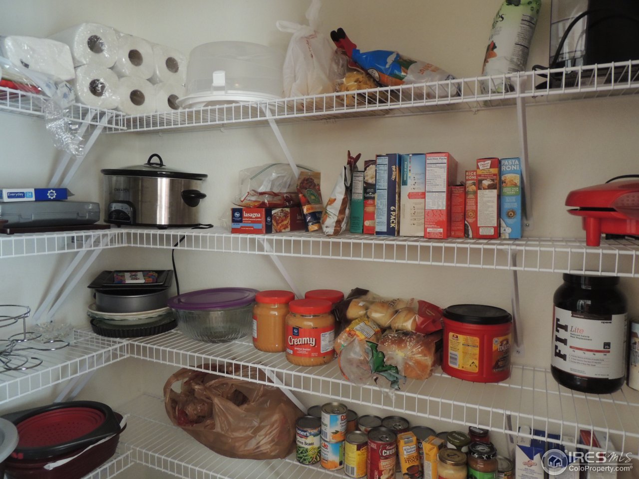 10442 Lower Ridge Road Longmont, CO 80504 - Photo 5 of 20 Walk in Pantry
