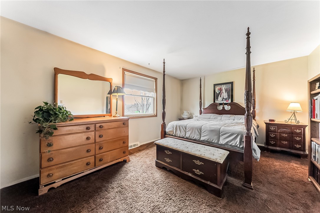 16775 Snyder Road Chagrin Falls, OH 44023 - Photo 13 of 31 Bedroom with dark colored carpet