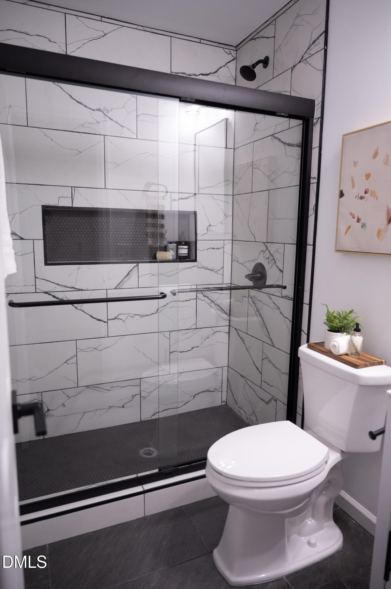 809 Leon Street Durham, NC 27704 - Photo 14 of 30 a bathroom with a toilet a sink and shower