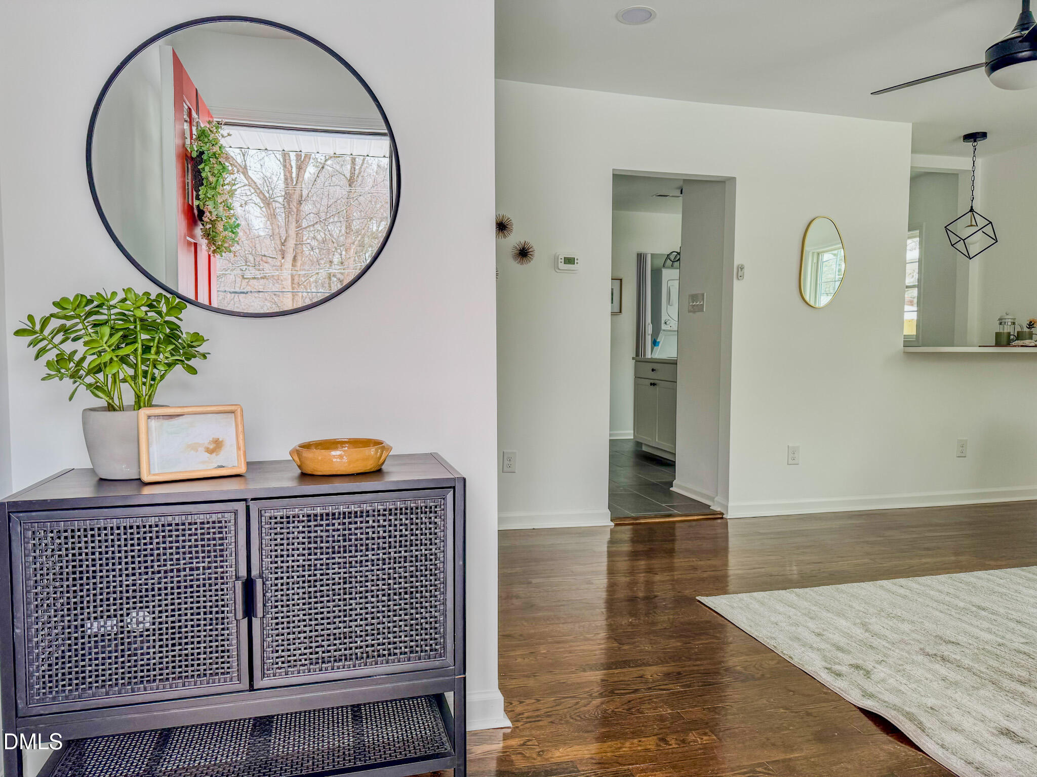 809 Leon Street Durham, NC 27704 - Photo 2 of 30 an entryway with wooden floor and a potted plant