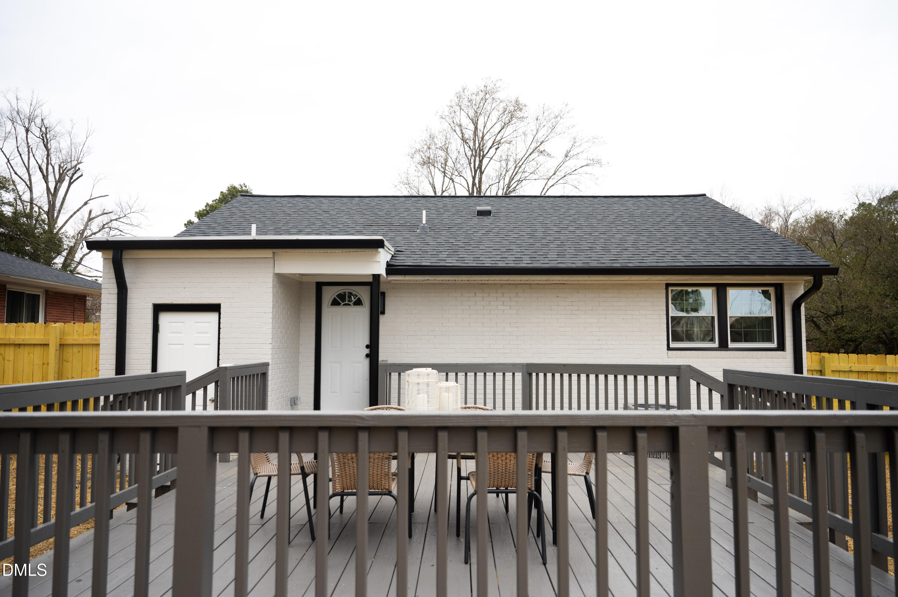 809 Leon Street Durham, NC 27704 - Photo 25 of 30 a view of a house with wooden fence