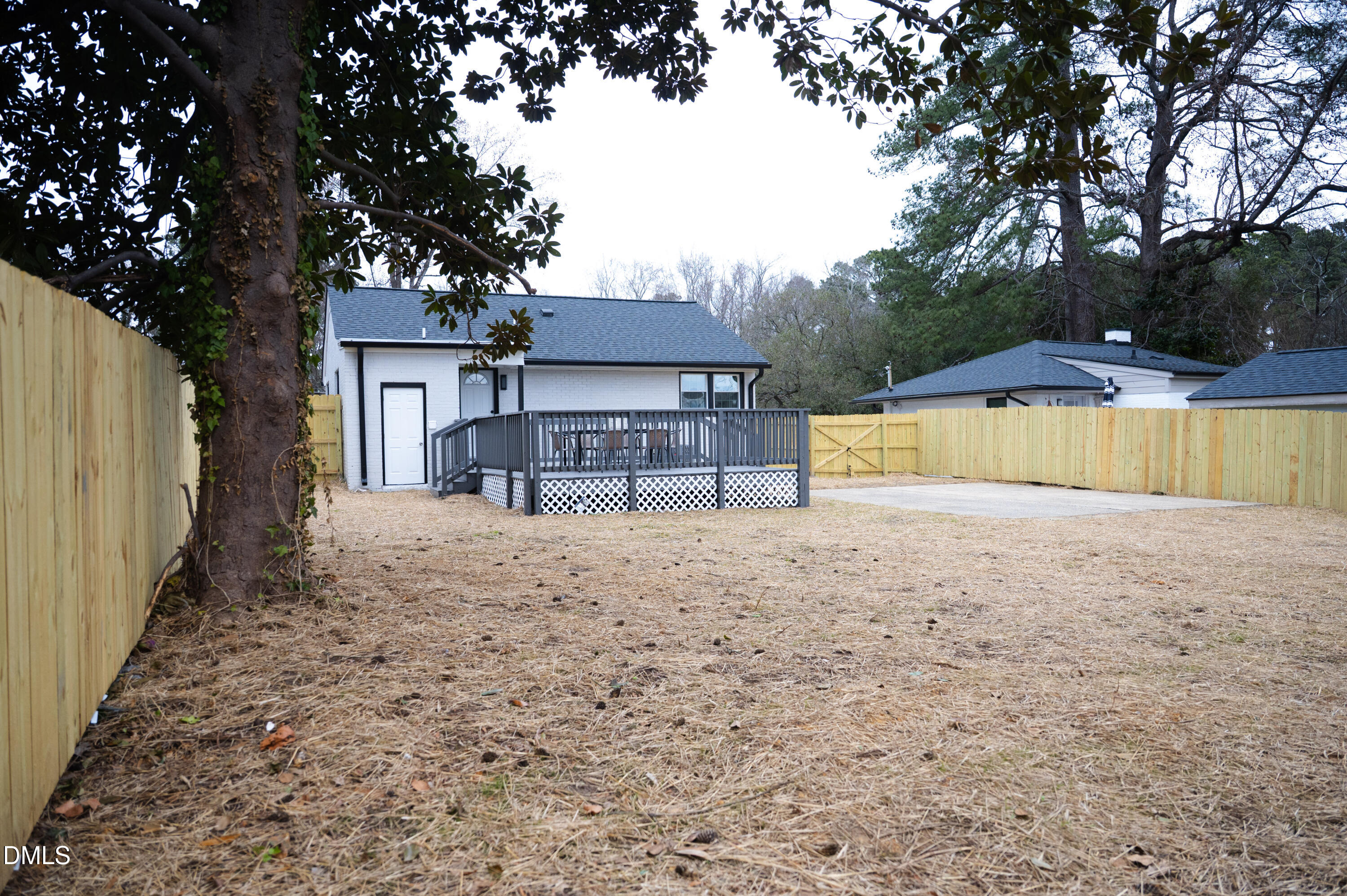 809 Leon Street Durham, NC 27704 - Photo 30 of 30 a view of a house with a yard and large tree