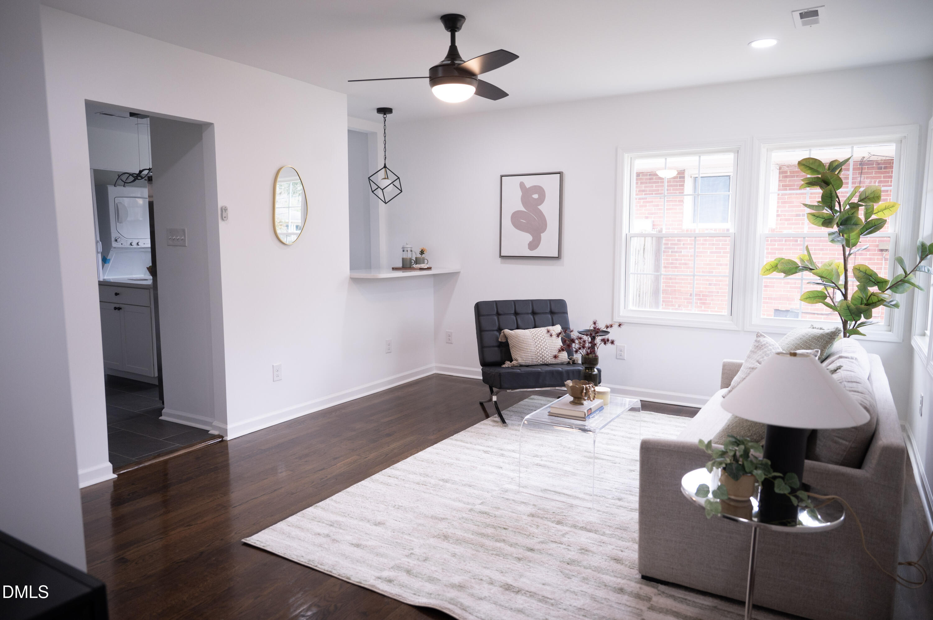 809 Leon Street Durham, NC 27704 - Photo 3 of 30 a living room with furniture and wooden floor
