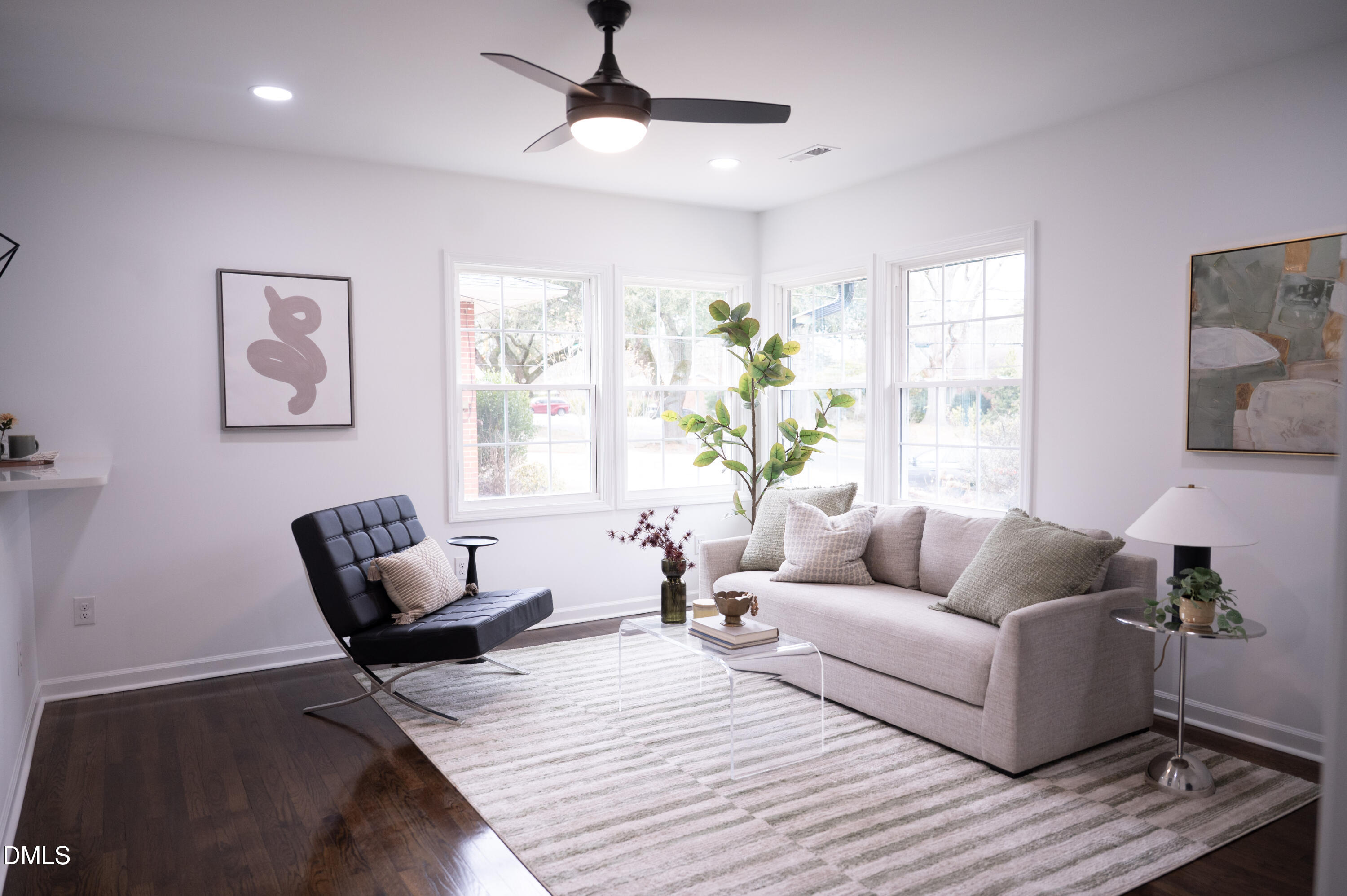 809 Leon Street Durham, NC 27704 - Photo 4 of 30 a living room with furniture and a large window