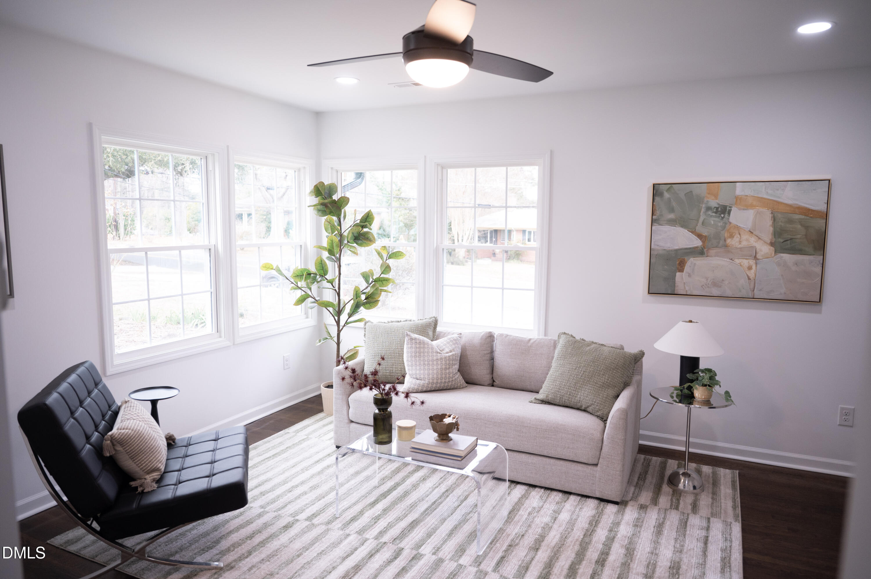809 Leon Street Durham, NC 27704 - Photo 5 of 30 a living room with furniture and a potted plant