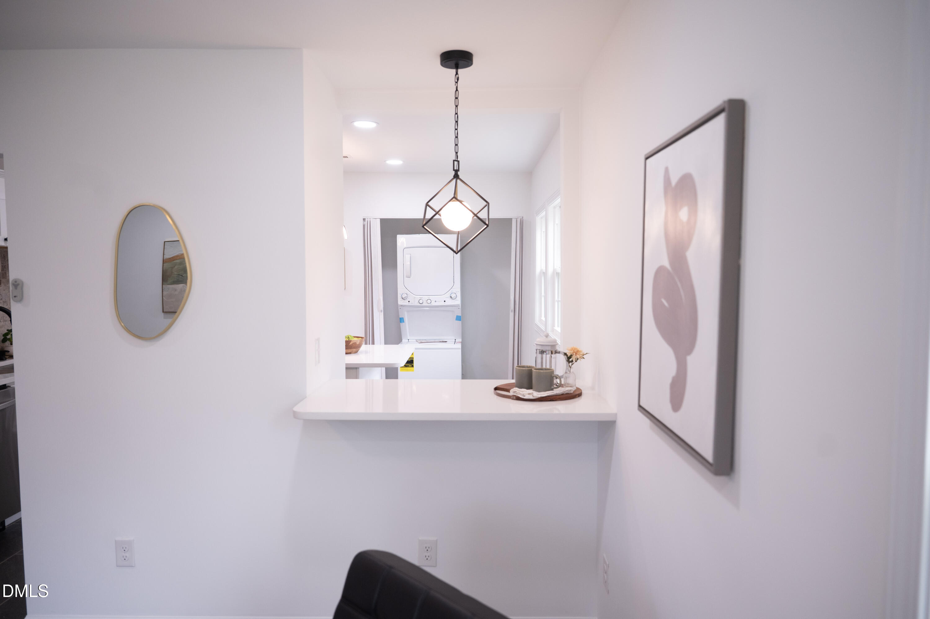 809 Leon Street Durham, NC 27704 - Photo 7 of 30 a room with a mirror and a window