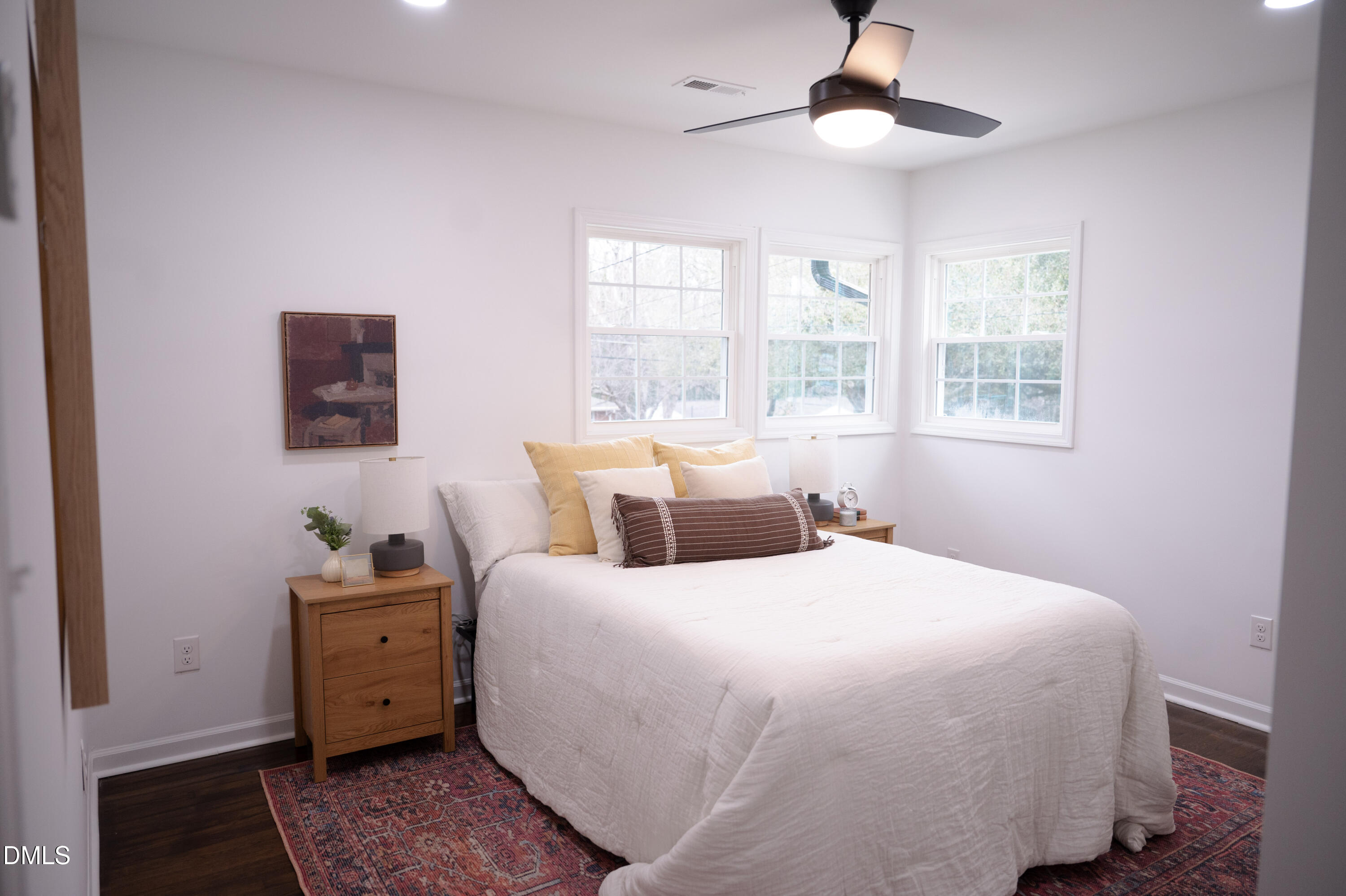 809 Leon Street Durham, NC 27704 - Photo 8 of 30 a bedroom with a bed and a window