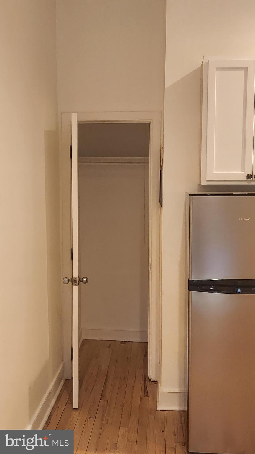 459 M Street Northwest, Unit A Washington, DC 20001 - Photo 8 of 10 a view of empty room with wooden floor