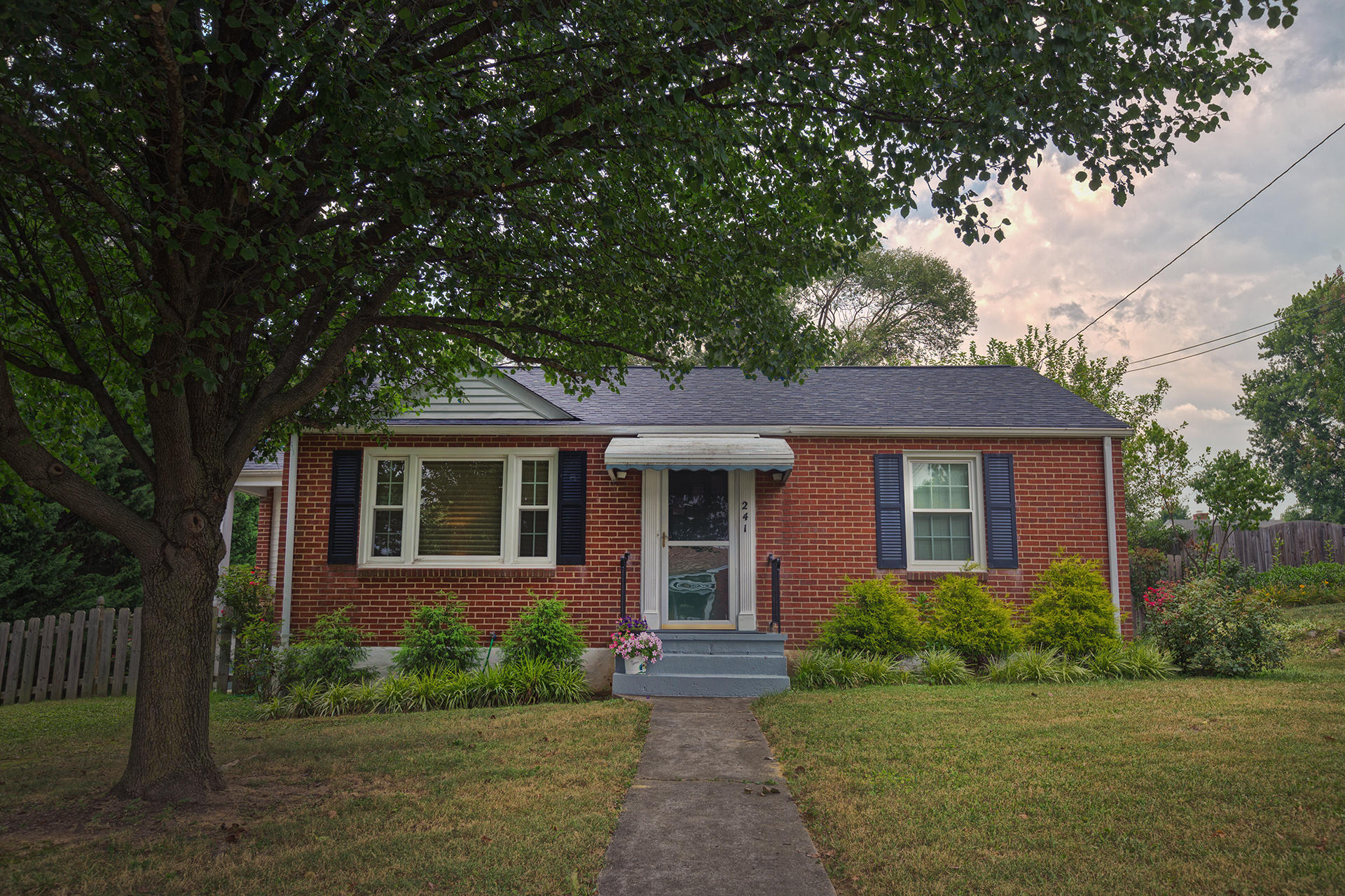 241 Knoll Road Roanoke, VA 24019 - Photo 2 of 18 a front view of a house with garden