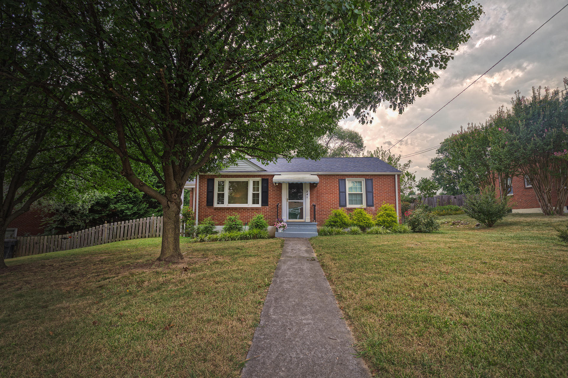 241 Knoll Road Roanoke, VA 24019 - Photo 3 of 18 a front view of a house with a yard