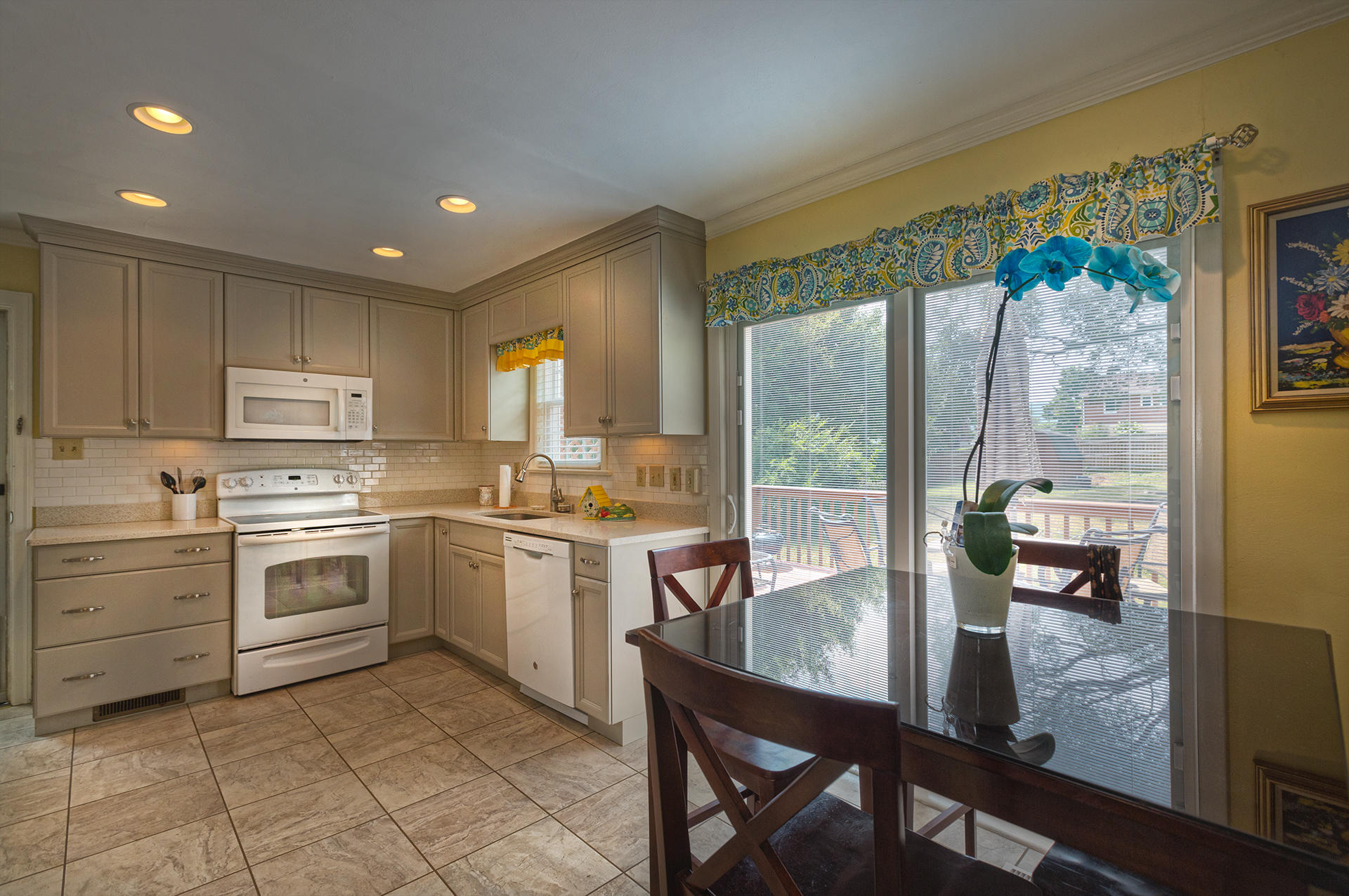 241 Knoll Road Roanoke, VA 24019 - Photo 6 of 18 a kitchen with a table chairs sink and cabinets