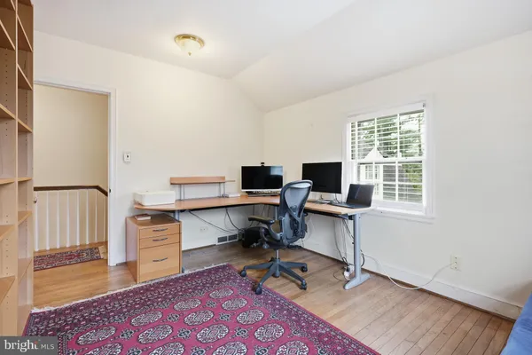 a bedroom with a bed and a closet