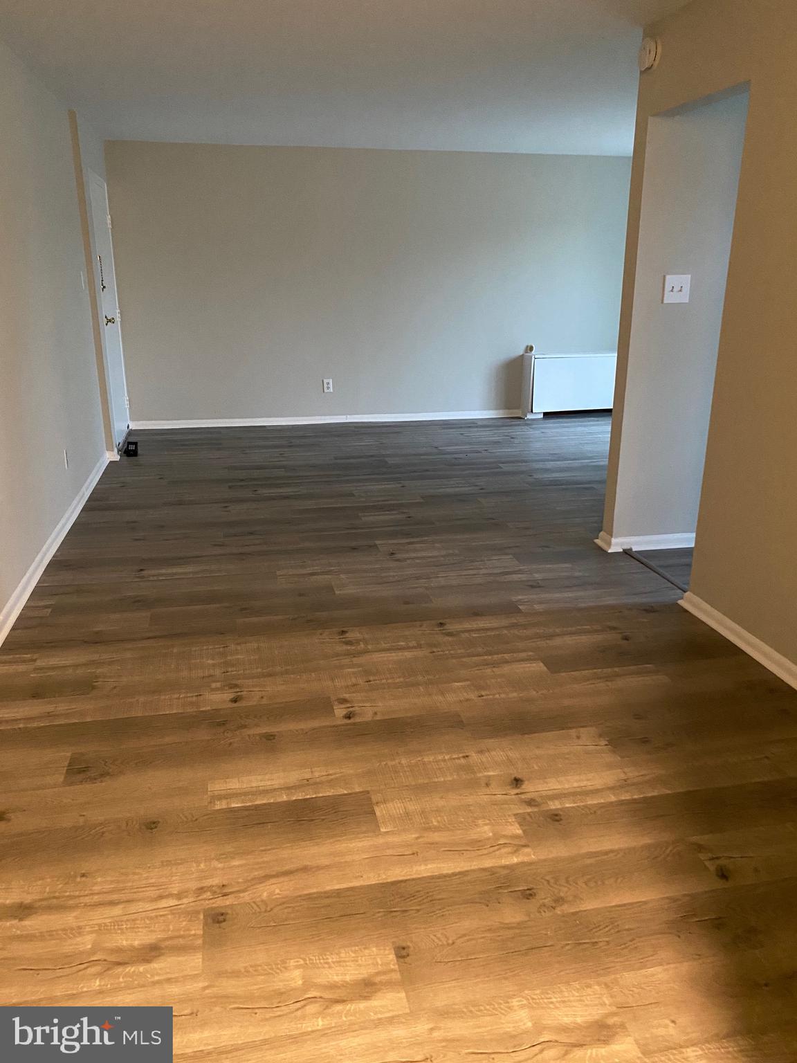 4256 Buckman Road, Unit 27 Alexandria, VA 22309 - Photo 11 of 30 a view of a room with wooden floor