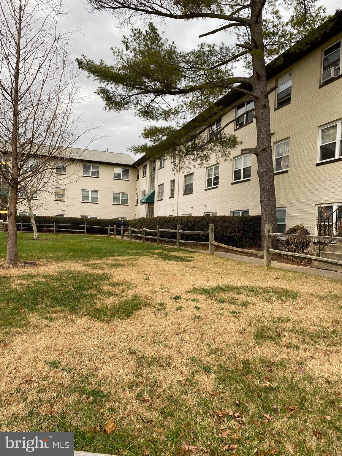4256 Buckman Road, Unit 27 Alexandria, VA 22309 - Photo 29 of 30 a view of a house with a yard
