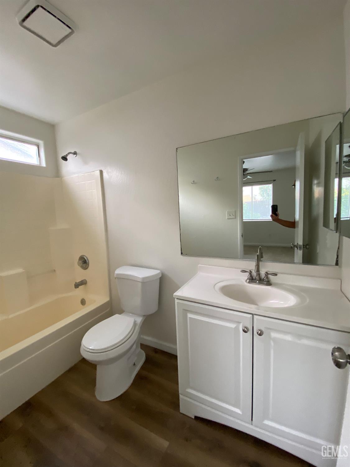 Undisclosed Address Bakersfield, CA 93307 - Photo 22 of 34 a bathroom with a sink toilet vanity and tub