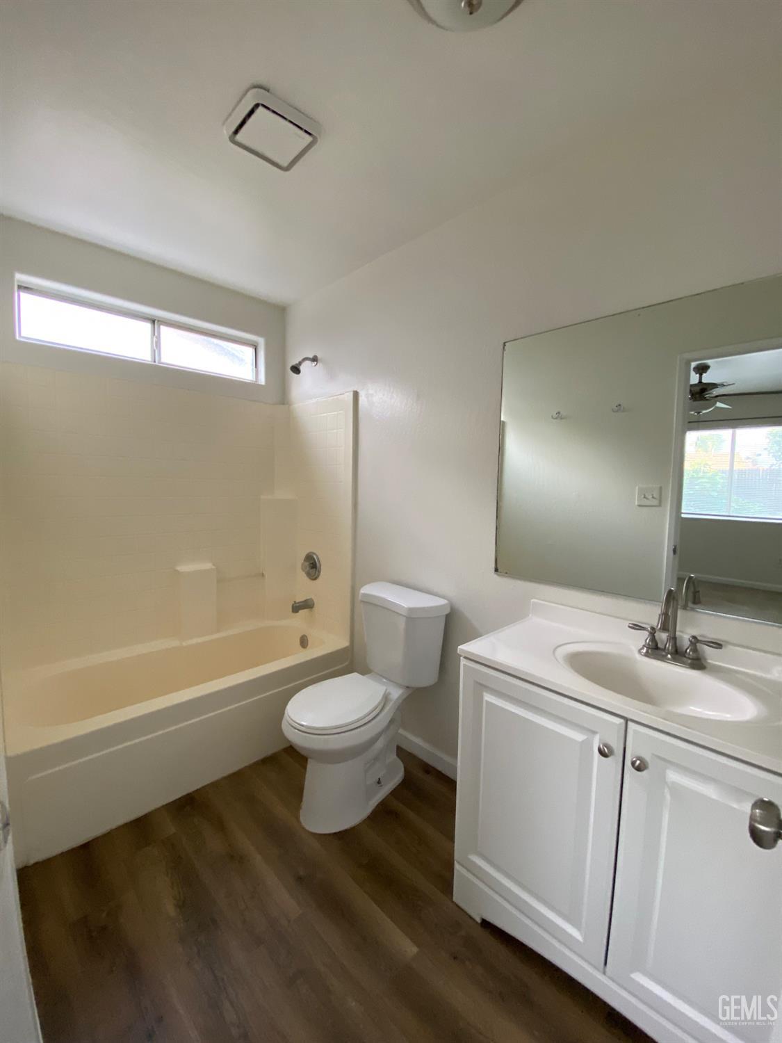 Undisclosed Address Bakersfield, CA 93307 - Photo 23 of 34 a bathroom with a sink a toilet and a bathtub