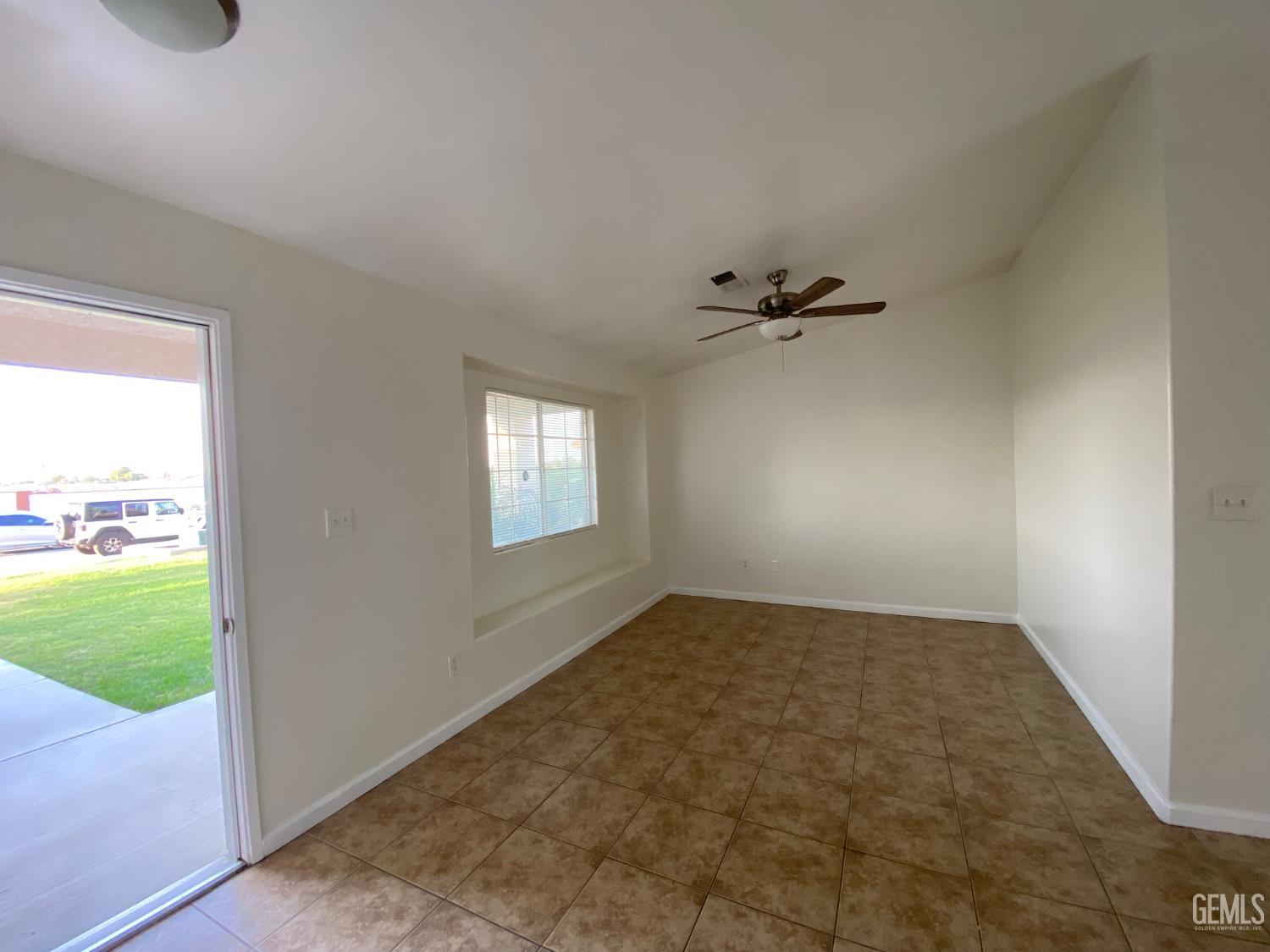 Undisclosed Address Bakersfield, CA 93307 - Photo 6 of 34 a view of an empty room and window