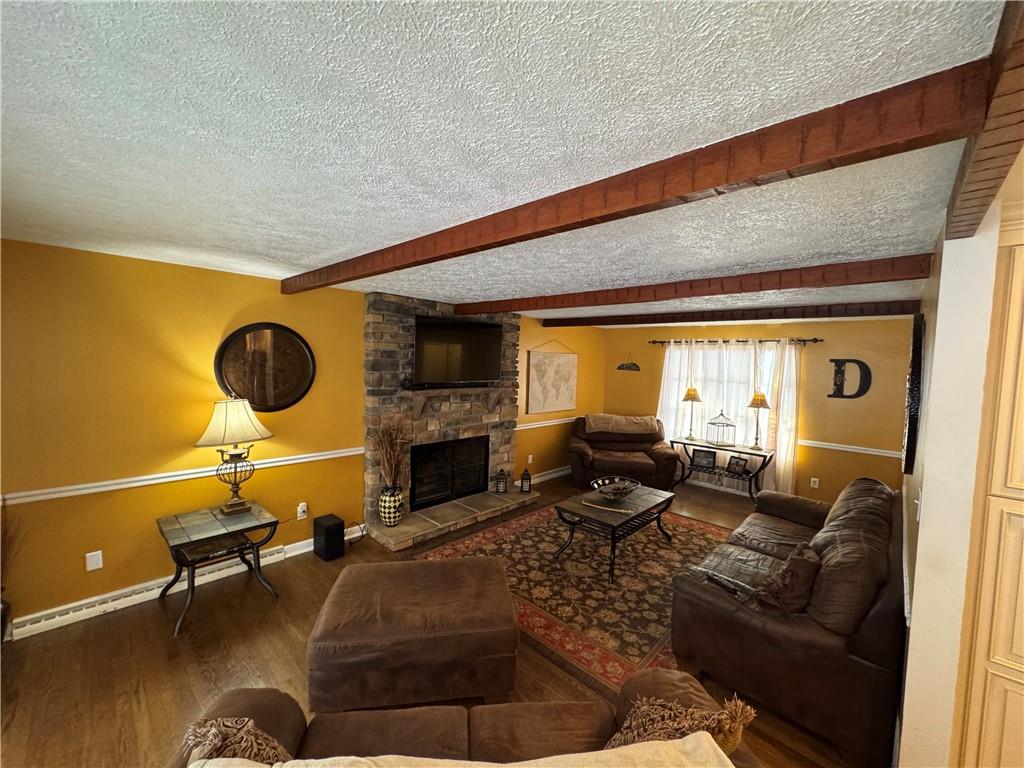 2072 Boyd School Road Wampum, PA 16157 - Photo 13 of 45 a living room with furniture or fireplace and a floor to ceiling window