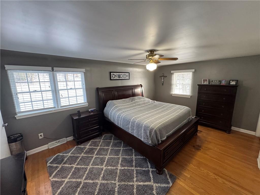 2072 Boyd School Road Wampum, PA 16157 - Photo 16 of 45 a bedroom with a large bed and a window