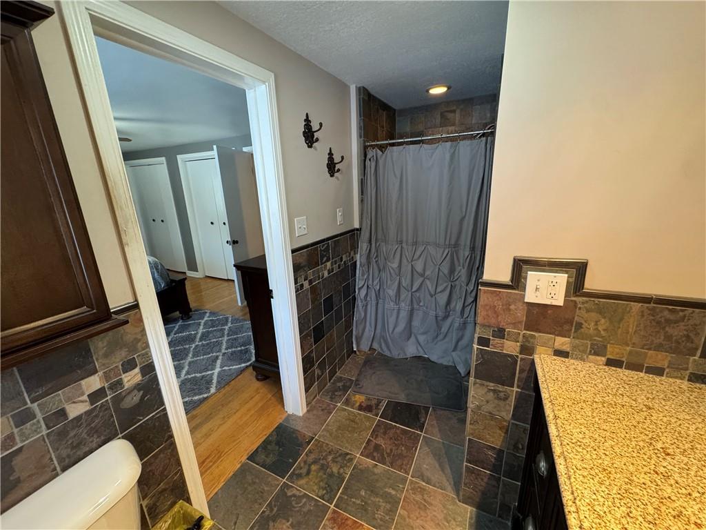2072 Boyd School Road Wampum, PA 16157 - Photo 18 of 45 a bathroom with a sink and mirror