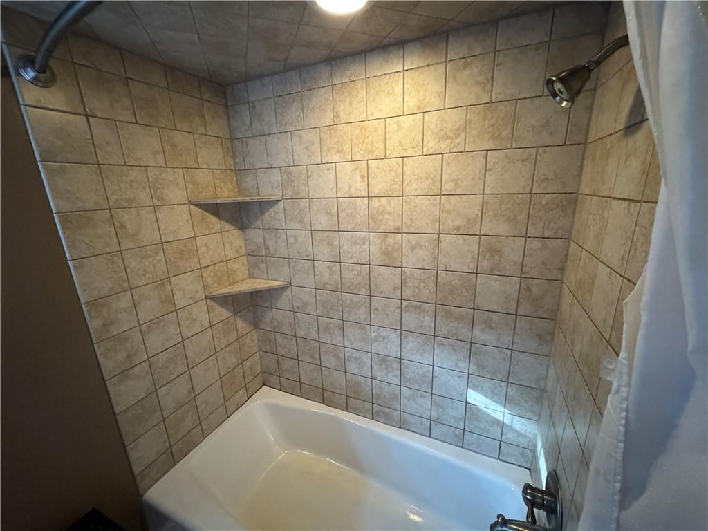 2072 Boyd School Road Wampum, PA 16157 - Photo 26 of 45 a bathroom with a bathtub