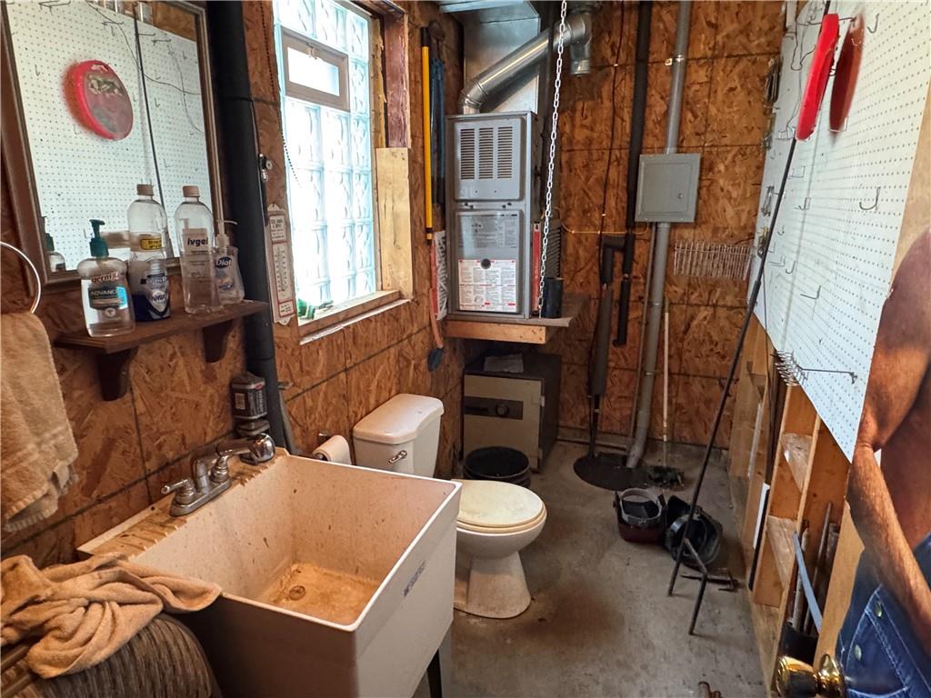 2072 Boyd School Road Wampum, PA 16157 - Photo 39 of 45 a bathroom with a toilet sink and tub