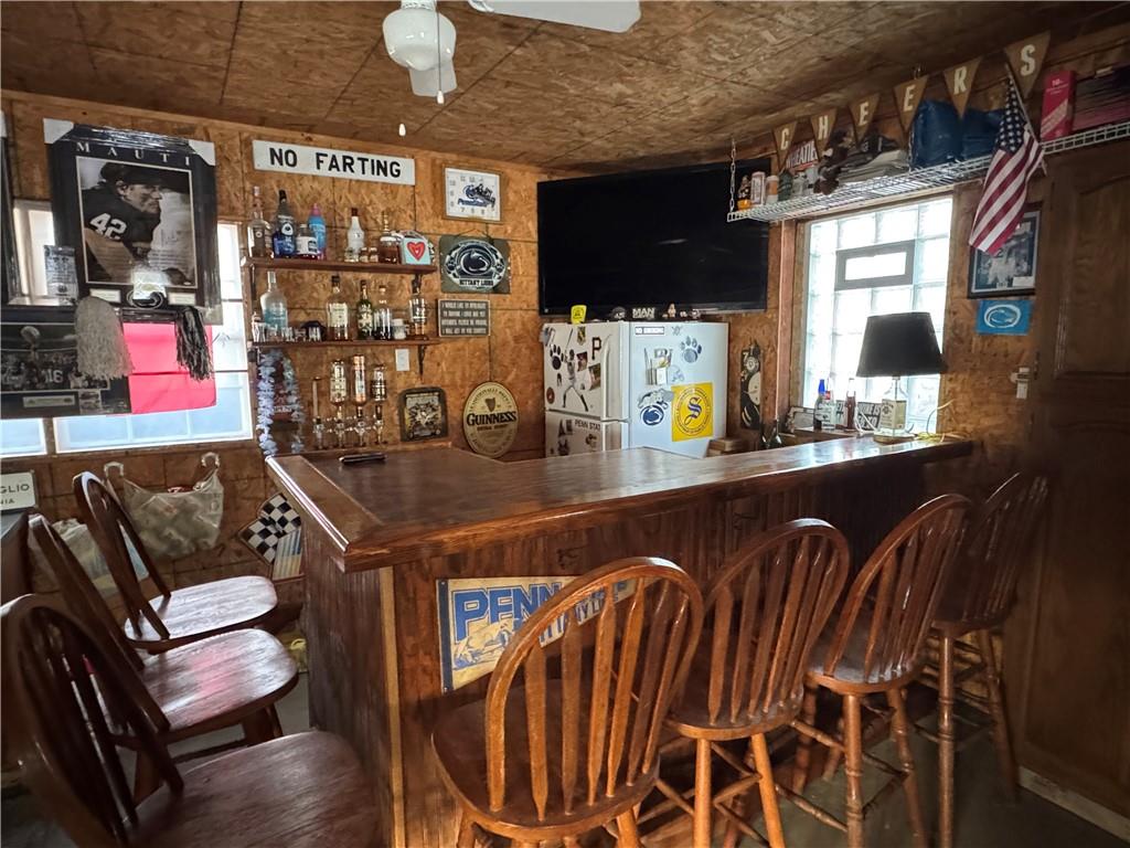 2072 Boyd School Road Wampum, PA 16157 - Photo 40 of 45 a view of a dining room with furniture and chandelier