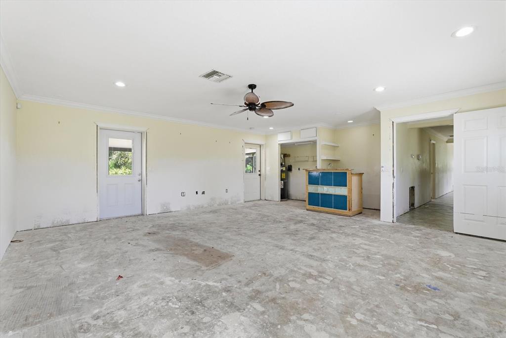 229 Stratford Road Englewood, FL 34223 - Photo 22 of 49 a view of a big room with closet and windows