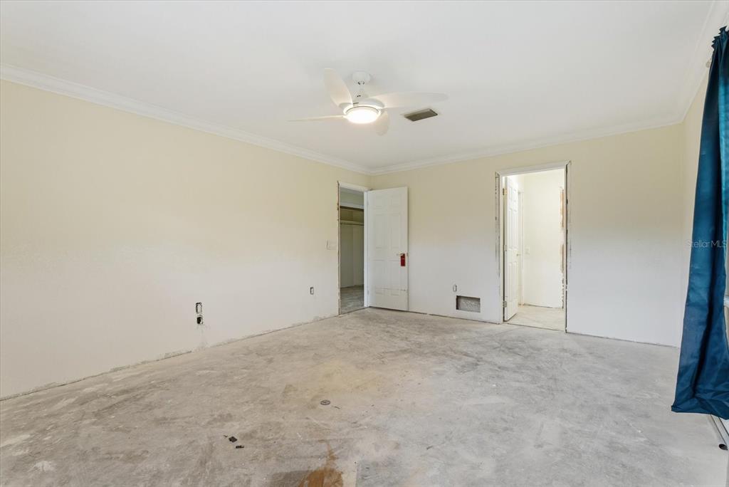 229 Stratford Road Englewood, FL 34223 - Photo 26 of 49 an empty room with an entryway