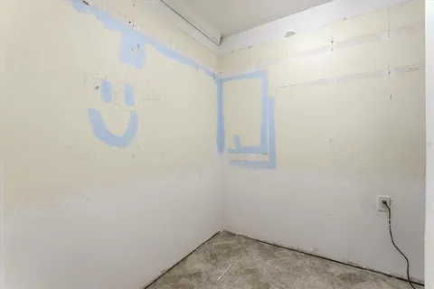 a bathroom with a toilet a sink and bathtub