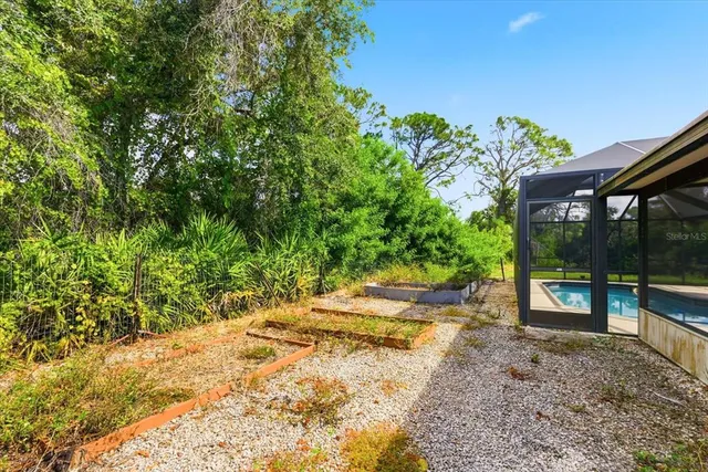 a view of swimming pool with patio