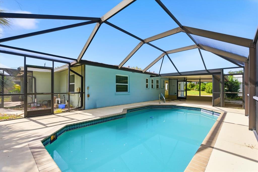 229 Stratford Road Englewood, FL 34223 - Photo 32 of 49 a view of swimming pool with patio