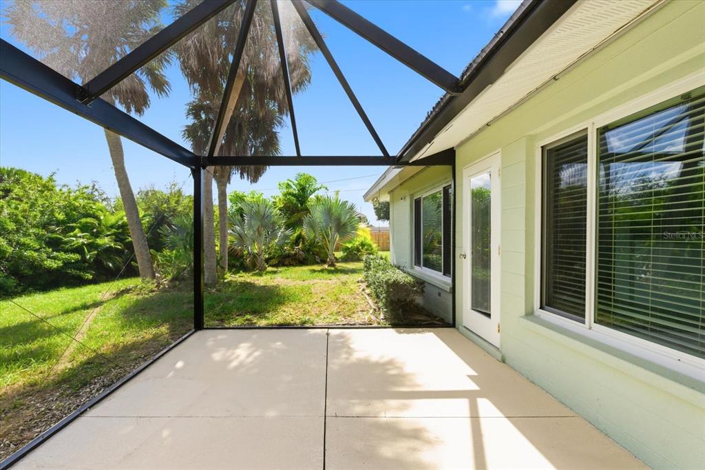 229 Stratford Road Englewood, FL 34223 - Photo 37 of 49 a view of a porch with a garden