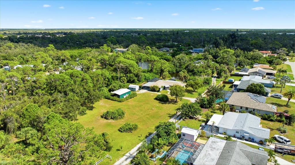 229 Stratford Road Englewood, FL 34223 - Photo 41 of 49 an aerial view of residential house with swimming pool and outdoor space